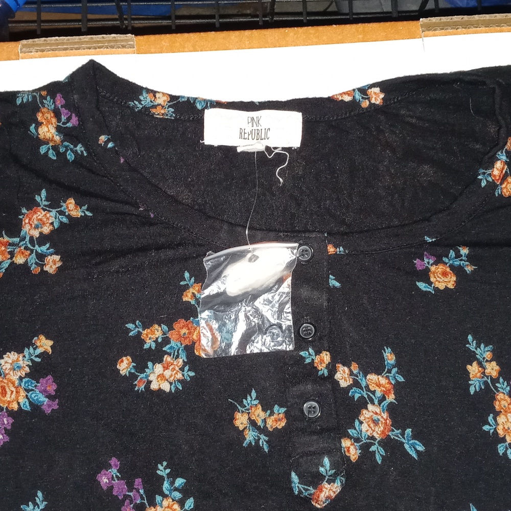 Long sleeved light floral shirt